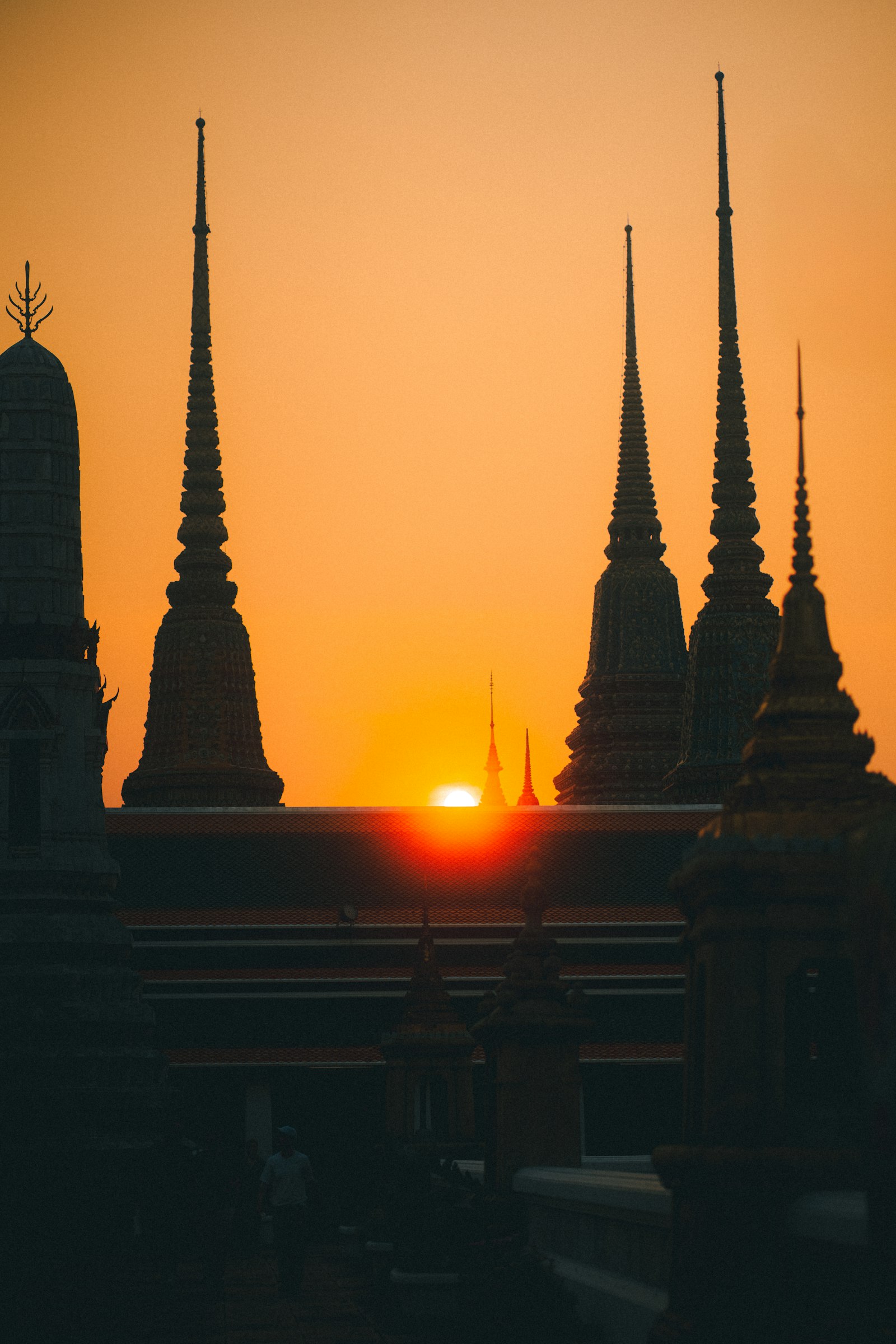 Sunset silhouettes of Buddhist temples in Thailand